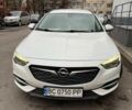 Білий Опель Інсігнія, об'ємом двигуна 2 л та пробігом 228 тис. км за 13400 $, фото 1 на Automoto.ua