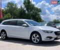 Білий Опель Інсігнія, об'ємом двигуна 2 л та пробігом 261 тис. км за 13299 $, фото 4 на Automoto.ua