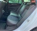 Білий Опель Інсігнія, об'ємом двигуна 2 л та пробігом 261 тис. км за 13299 $, фото 28 на Automoto.ua
