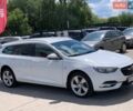 Білий Опель Інсігнія, об'ємом двигуна 2 л та пробігом 261 тис. км за 13299 $, фото 6 на Automoto.ua