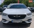Білий Опель Інсігнія, об'ємом двигуна 2 л та пробігом 261 тис. км за 13299 $, фото 3 на Automoto.ua