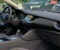 Білий Опель Інсігнія, об'ємом двигуна 2 л та пробігом 261 тис. км за 13299 $, фото 35 на Automoto.ua