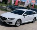 Білий Опель Інсігнія, об'ємом двигуна 2 л та пробігом 261 тис. км за 13299 $, фото 2 на Automoto.ua