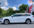 Білий Опель Інсігнія, об'ємом двигуна 2 л та пробігом 261 тис. км за 13299 $, фото 11 на Automoto.ua