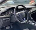 Білий Опель Інсігнія, об'ємом двигуна 2 л та пробігом 261 тис. км за 13299 $, фото 25 на Automoto.ua
