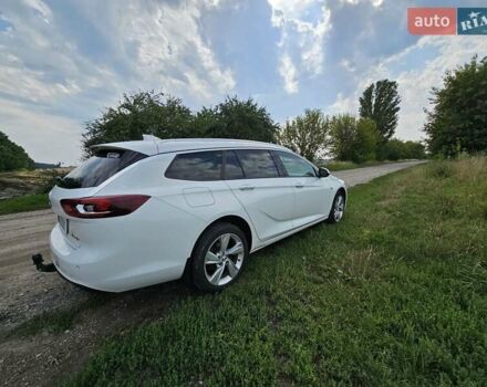 Белый Опель Инсигния, объемом двигателя 2 л и пробегом 191 тыс. км за 15500 $, фото 5 на Automoto.ua