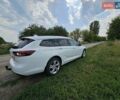 Белый Опель Инсигния, объемом двигателя 2 л и пробегом 191 тыс. км за 15500 $, фото 5 на Automoto.ua