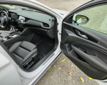 Белый Опель Инсигния, объемом двигателя 2 л и пробегом 245 тыс. км за 15700 $, фото 9 на Automoto.ua