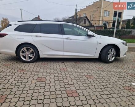 Белый Опель Инсигния, объемом двигателя 1.96 л и пробегом 223 тыс. км за 15000 $, фото 2 на Automoto.ua