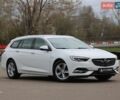 Белый Опель Инсигния, объемом двигателя 2 л и пробегом 240 тыс. км за 15900 $, фото 1 на Automoto.ua