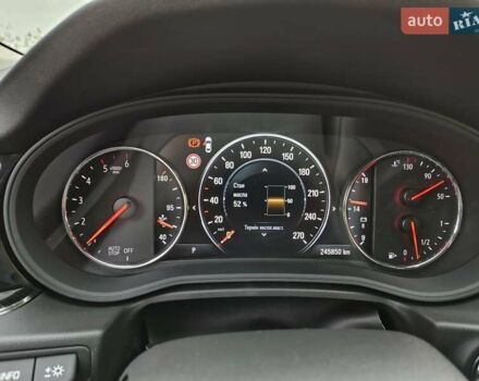 Білий Опель Інсігнія, об'ємом двигуна 2 л та пробігом 245 тис. км за 15700 $, фото 19 на Automoto.ua