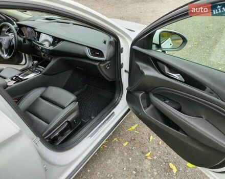 Білий Опель Інсігнія, об'ємом двигуна 2 л та пробігом 245 тис. км за 15700 $, фото 10 на Automoto.ua