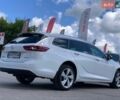Білий Опель Інсігнія, об'ємом двигуна 2 л та пробігом 261 тис. км за 13299 $, фото 14 на Automoto.ua