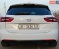 Белый Опель Инсигния, объемом двигателя 1.6 л и пробегом 168 тыс. км за 14999 $, фото 1 на Automoto.ua