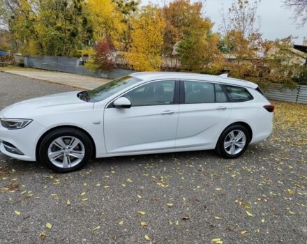 Белый Опель Инсигния, объемом двигателя 2 л и пробегом 245 тыс. км за 15700 $, фото 1 на Automoto.ua