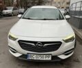 Білий Опель Інсігнія, об'ємом двигуна 2 л та пробігом 225 тис. км за 13900 $, фото 1 на Automoto.ua