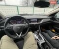 Білий Опель Інсігнія, об'ємом двигуна 2 л та пробігом 240 тис. км за 14200 $, фото 2 на Automoto.ua