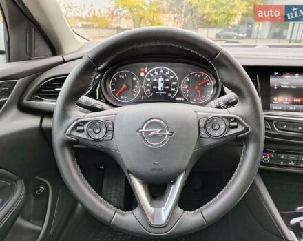 Білий Опель Інсігнія, об'ємом двигуна 2 л та пробігом 245 тис. км за 15700 $, фото 16 на Automoto.ua