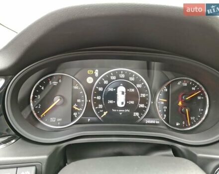 Білий Опель Інсігнія, об'ємом двигуна 2 л та пробігом 245 тис. км за 15700 $, фото 17 на Automoto.ua