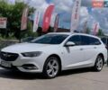 Білий Опель Інсігнія, об'ємом двигуна 2 л та пробігом 261 тис. км за 13299 $, фото 1 на Automoto.ua
