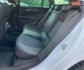 Білий Опель Інсігнія, об'ємом двигуна 2 л та пробігом 191 тис. км за 13299 $, фото 28 на Automoto.ua