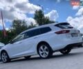 Білий Опель Інсігнія, об'ємом двигуна 2 л та пробігом 261 тис. км за 13299 $, фото 18 на Automoto.ua