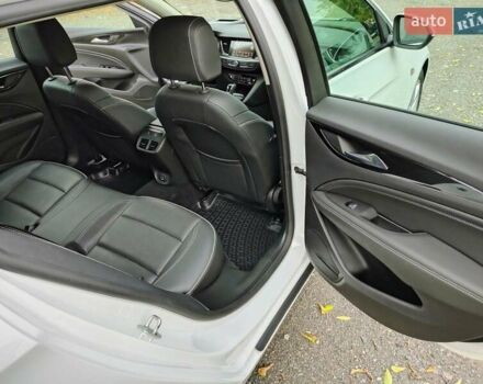 Білий Опель Інсігнія, об'ємом двигуна 2 л та пробігом 245 тис. км за 15700 $, фото 9 на Automoto.ua