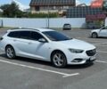 Білий Опель Інсігнія, об'ємом двигуна 2 л та пробігом 240 тис. км за 14200 $, фото 1 на Automoto.ua