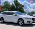 Білий Опель Інсігнія, об'ємом двигуна 2 л та пробігом 191 тис. км за 13299 $, фото 4 на Automoto.ua