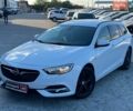 Белый Опель Инсигния, объемом двигателя 2 л и пробегом 228 тыс. км за 12490 $, фото 1 на Automoto.ua