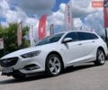 Білий Опель Інсігнія, об'ємом двигуна 2 л та пробігом 261 тис. км за 13299 $, фото 1 на Automoto.ua