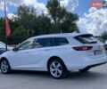 Білий Опель Інсігнія, об'ємом двигуна 2 л та пробігом 261 тис. км за 13299 $, фото 17 на Automoto.ua