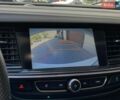 Білий Опель Інсігнія, об'ємом двигуна 2 л та пробігом 261 тис. км за 13299 $, фото 60 на Automoto.ua