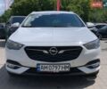 Білий Опель Інсігнія, об'ємом двигуна 2 л та пробігом 191 тис. км за 13299 $, фото 3 на Automoto.ua
