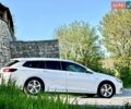 Білий Опель Інсігнія, об'ємом двигуна 1.6 л та пробігом 228 тис. км за 15800 $, фото 11 на Automoto.ua