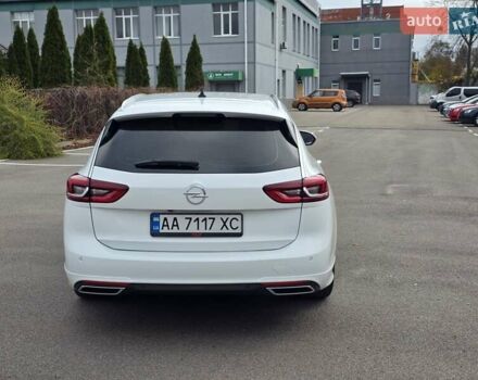Білий Опель Інсігнія, об'ємом двигуна 2 л та пробігом 225 тис. км за 16500 $, фото 5 на Automoto.ua