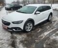 Білий Опель Інсігнія, об'ємом двигуна 2 л та пробігом 231 тис. км за 15000 $, фото 3 на Automoto.ua