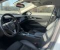 Белый Опель Инсигния, объемом двигателя 2 л и пробегом 240 тыс. км за 16500 $, фото 4 на Automoto.ua