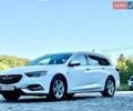 Білий Опель Інсігнія, об'ємом двигуна 1.6 л та пробігом 228 тис. км за 15800 $, фото 4 на Automoto.ua