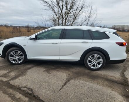 Білий Опель Інсігнія, об'ємом двигуна 2 л та пробігом 230 тис. км за 15400 $, фото 5 на Automoto.ua