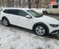 Білий Опель Інсігнія, об'ємом двигуна 2 л та пробігом 231 тис. км за 15000 $, фото 6 на Automoto.ua