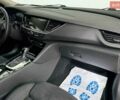Білий Опель Інсігнія, об'ємом двигуна 1.96 л та пробігом 152 тис. км за 18950 $, фото 10 на Automoto.ua