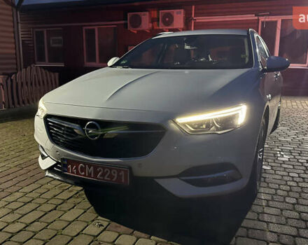 Білий Опель Інсігнія, об'ємом двигуна 1.96 л та пробігом 149 тис. км за 15500 $, фото 9 на Automoto.ua