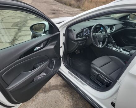 Білий Опель Інсігнія, об'ємом двигуна 2 л та пробігом 230 тис. км за 15400 $, фото 7 на Automoto.ua