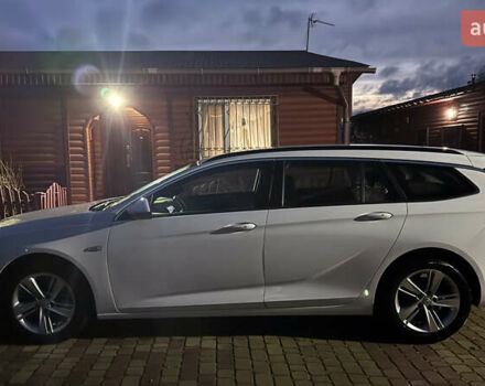 Білий Опель Інсігнія, об'ємом двигуна 1.96 л та пробігом 149 тис. км за 15500 $, фото 6 на Automoto.ua