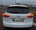 Білий Опель Інсігнія, об'ємом двигуна 2 л та пробігом 178 тис. км за 13000 $, фото 4 на Automoto.ua