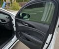 Білий Опель Інсігнія, об'ємом двигуна 2 л та пробігом 225 тис. км за 16500 $, фото 43 на Automoto.ua