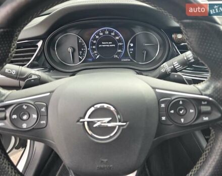 Білий Опель Інсігнія, об'ємом двигуна 2 л та пробігом 225 тис. км за 16500 $, фото 24 на Automoto.ua