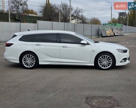 Білий Опель Інсігнія, об'ємом двигуна 2 л та пробігом 225 тис. км за 16500 $, фото 3 на Automoto.ua