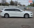 Білий Опель Інсігнія, об'ємом двигуна 2 л та пробігом 225 тис. км за 16500 $, фото 3 на Automoto.ua